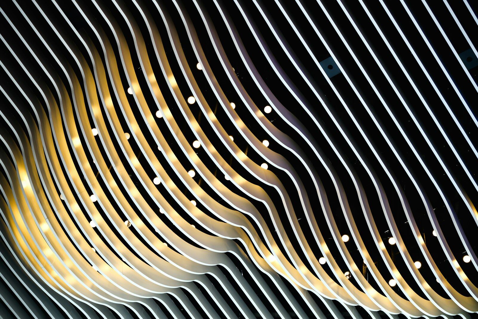 A close up of a metal object with lines on it